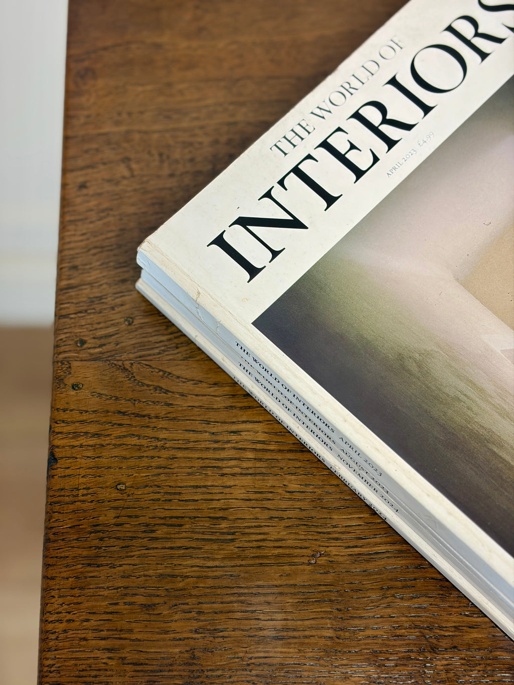 Antique light oak farmhouse chest of drawers with brass handles and patina