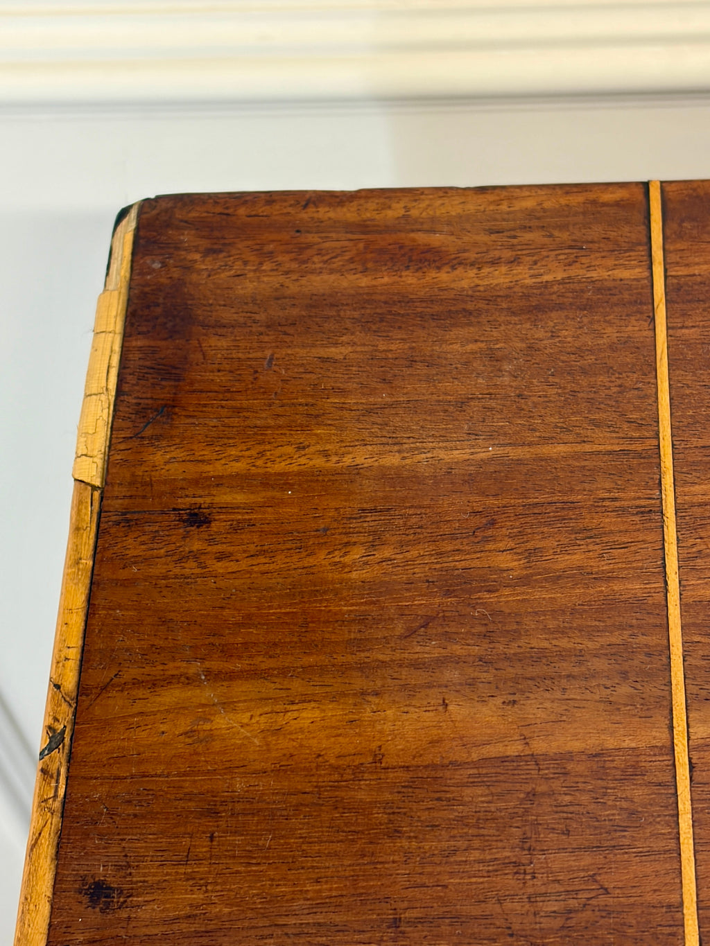 Close-up of a wooden surface with a visible grain pattern