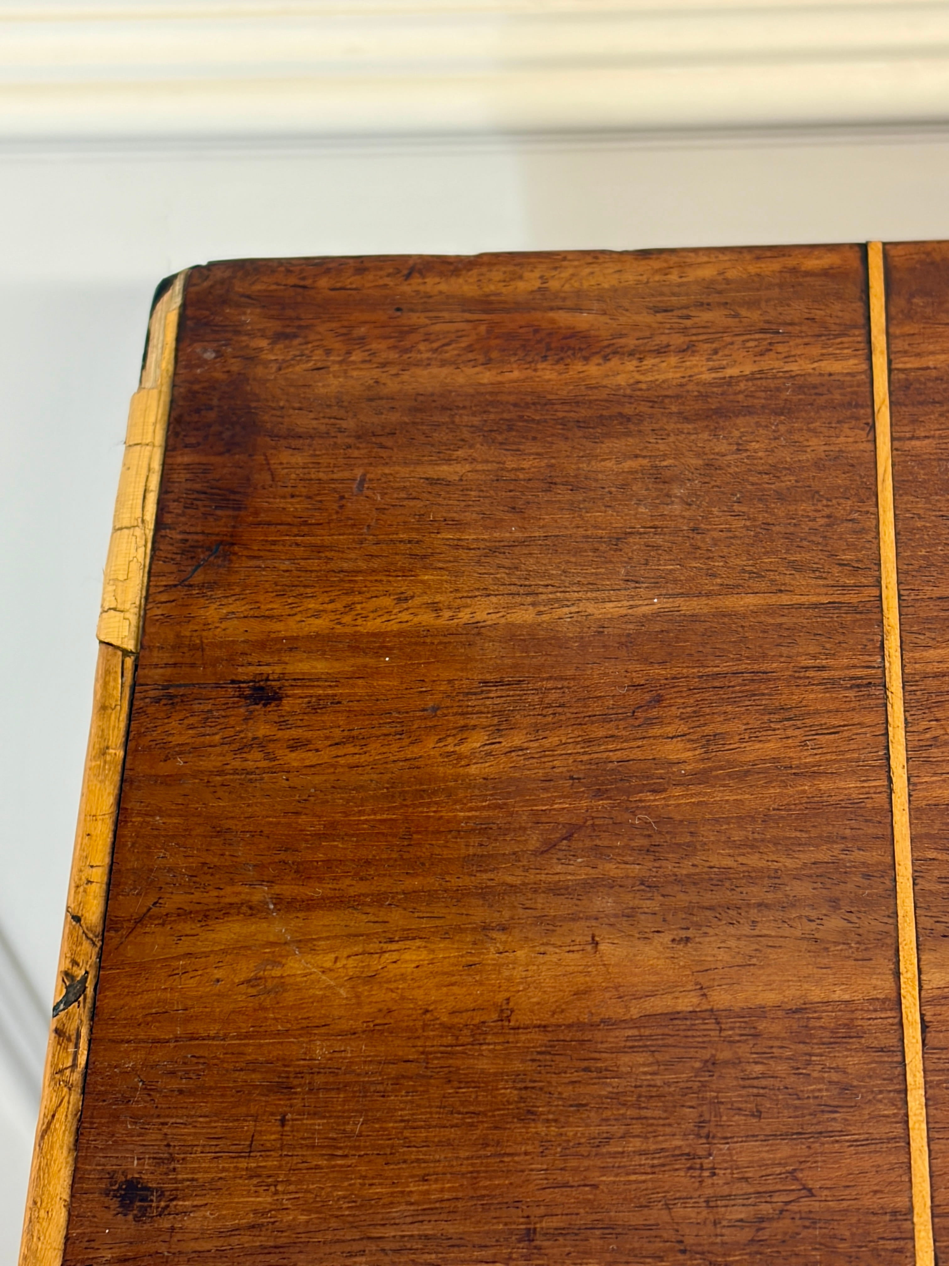 Close-up of a wooden surface with a visible grain pattern