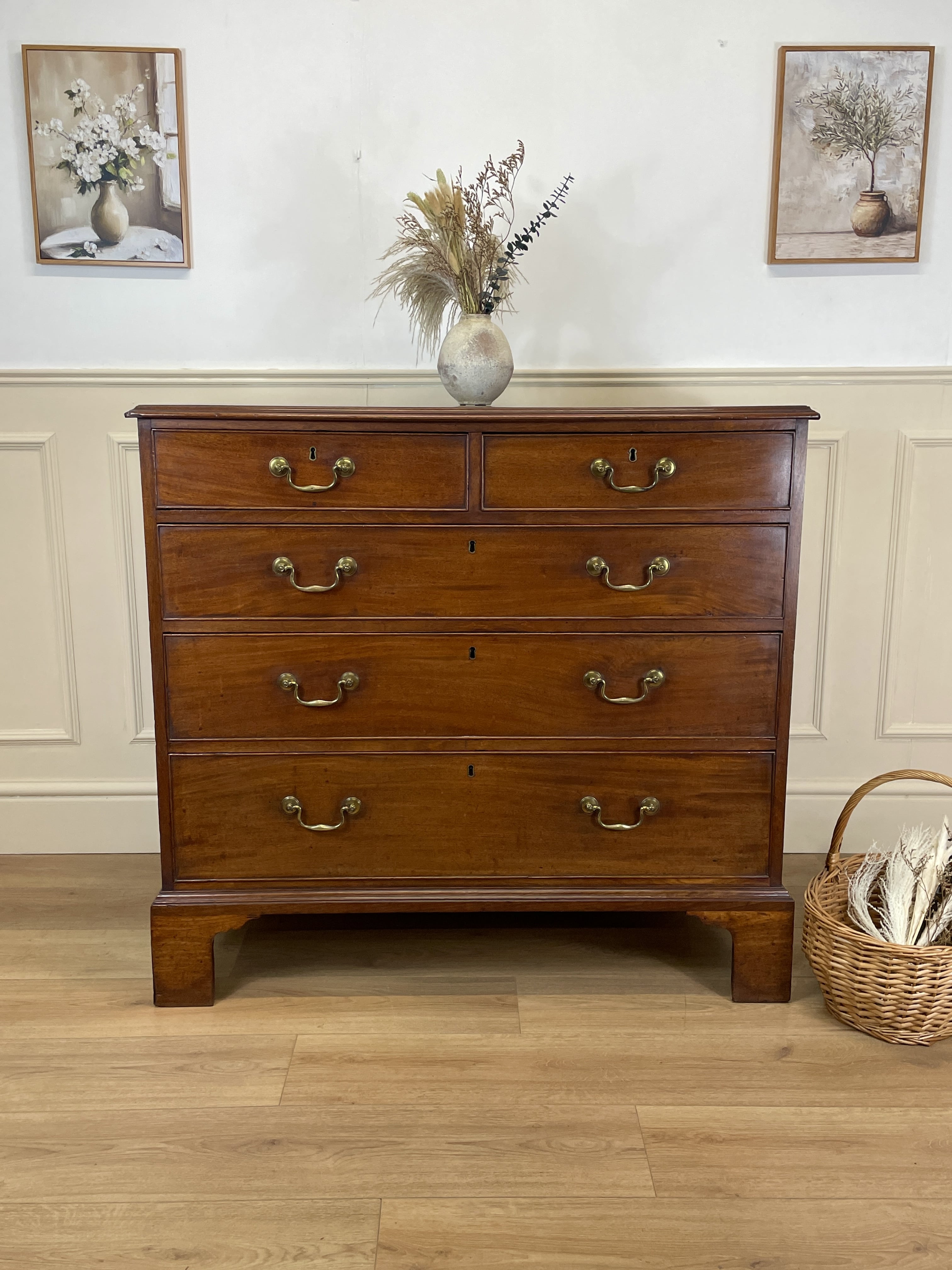 Antique Early Georgian mahogany straight front chest of drawers with original brass handles and flame mahogany finish, professionally restored by Taylors Antiques & Interiors.