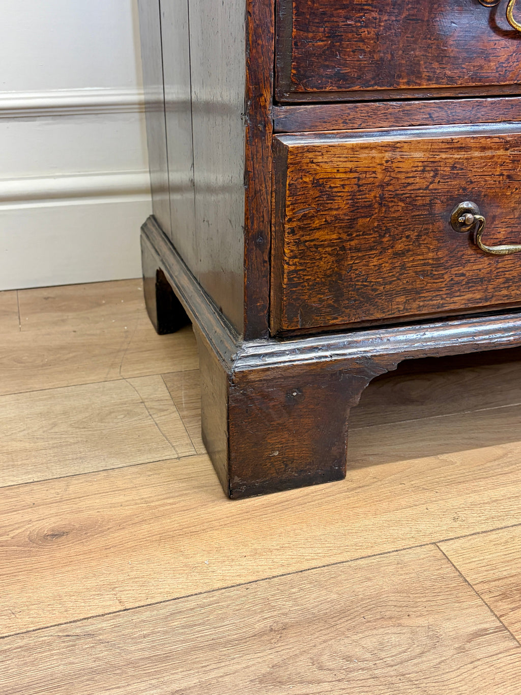 Wooden furniture with a drawer on a wooden floor