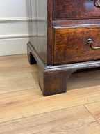 Wooden furniture with a drawer on a wooden floor