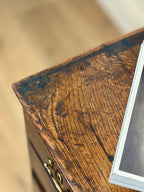 Close-up of a wooden surface with a blurred background