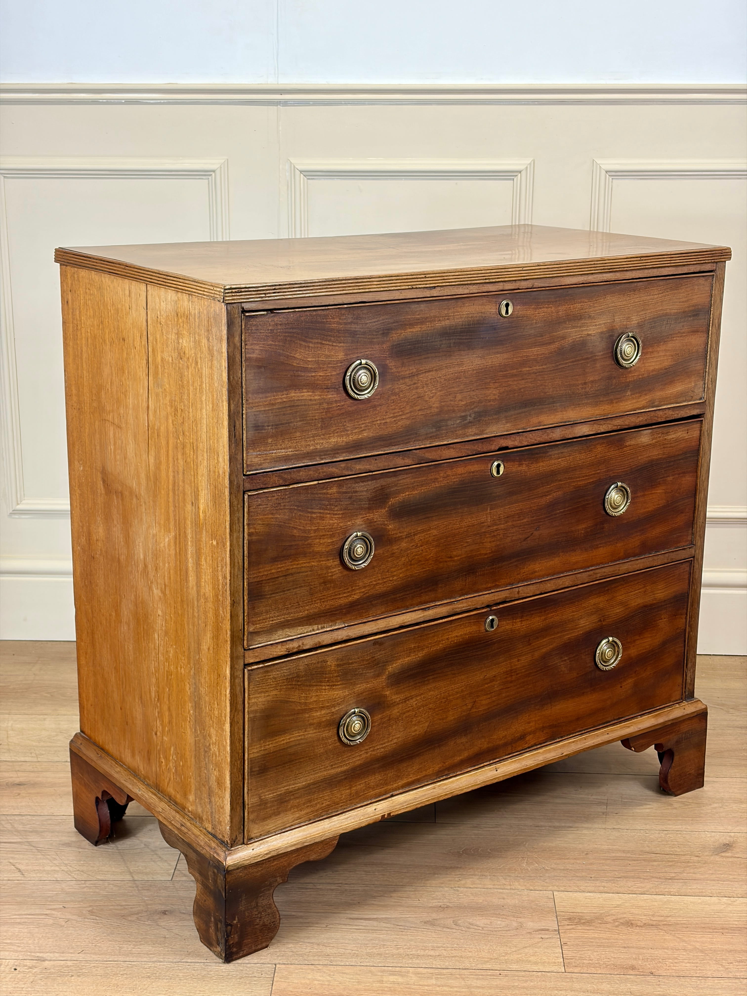 Antique small Georgian mahogany chest of drawers with three drawers and brass fittings