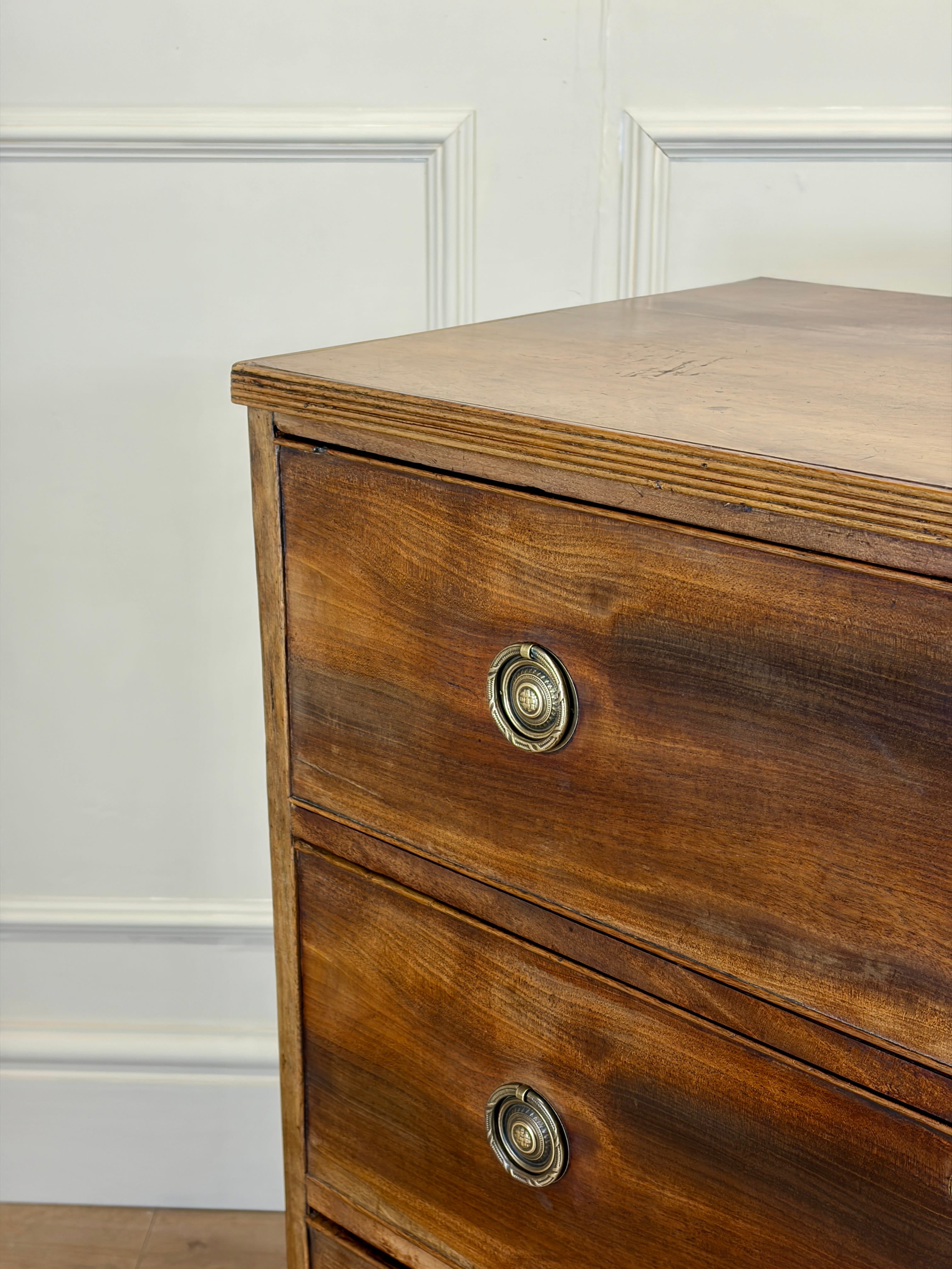 Antique small Georgian mahogany chest of drawers with three drawers and brass fittings