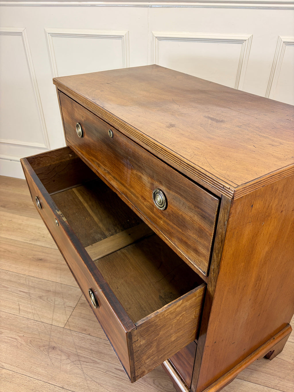 Antique small Georgian mahogany chest of drawers with three drawers and brass fittings
