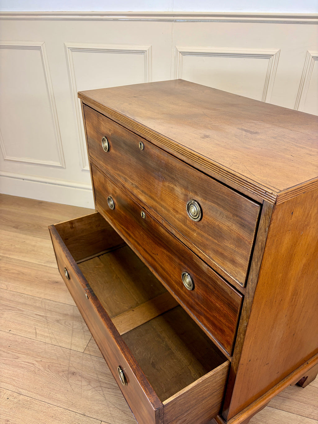 Antique small Georgian mahogany chest of drawers with three drawers and brass fittings