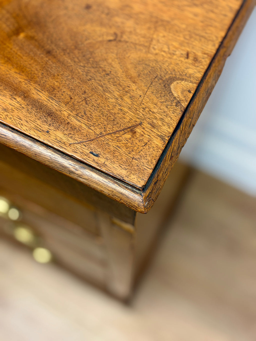 Close-up of a wooden surface with a blurred background