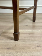 Wooden chair leg on a wooden floor