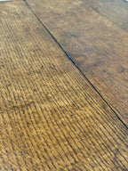 Close-up of a wooden floor with visible grain and texture