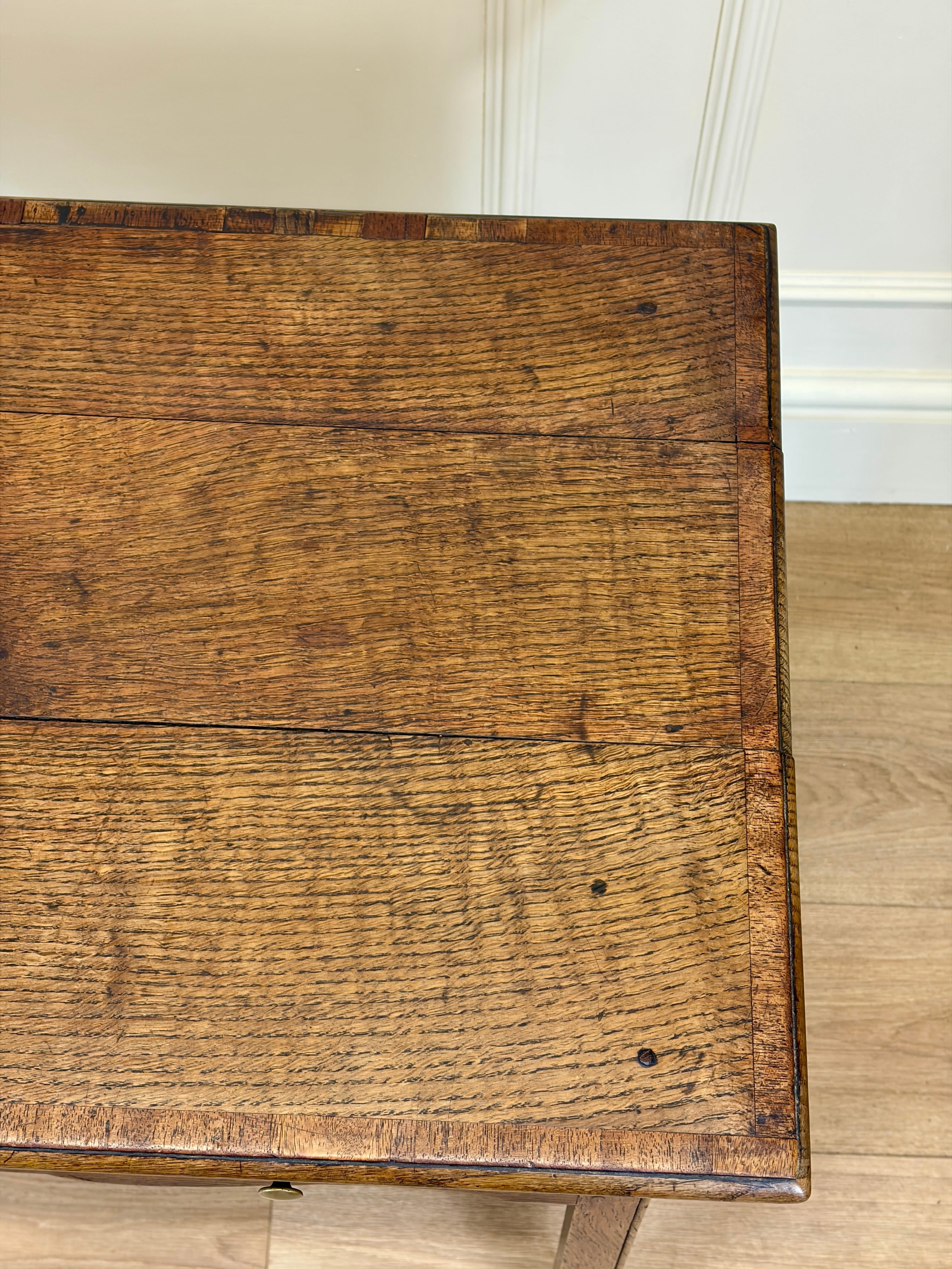 Close-up of a wooden surface with visible grain and texture.