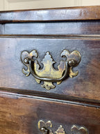 Antique Georgian mahogany bachelors chest of drawers with four long drawers on ogee bracket feet.