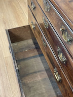 Antique Georgian mahogany bachelors chest of drawers with four long drawers on ogee bracket feet.