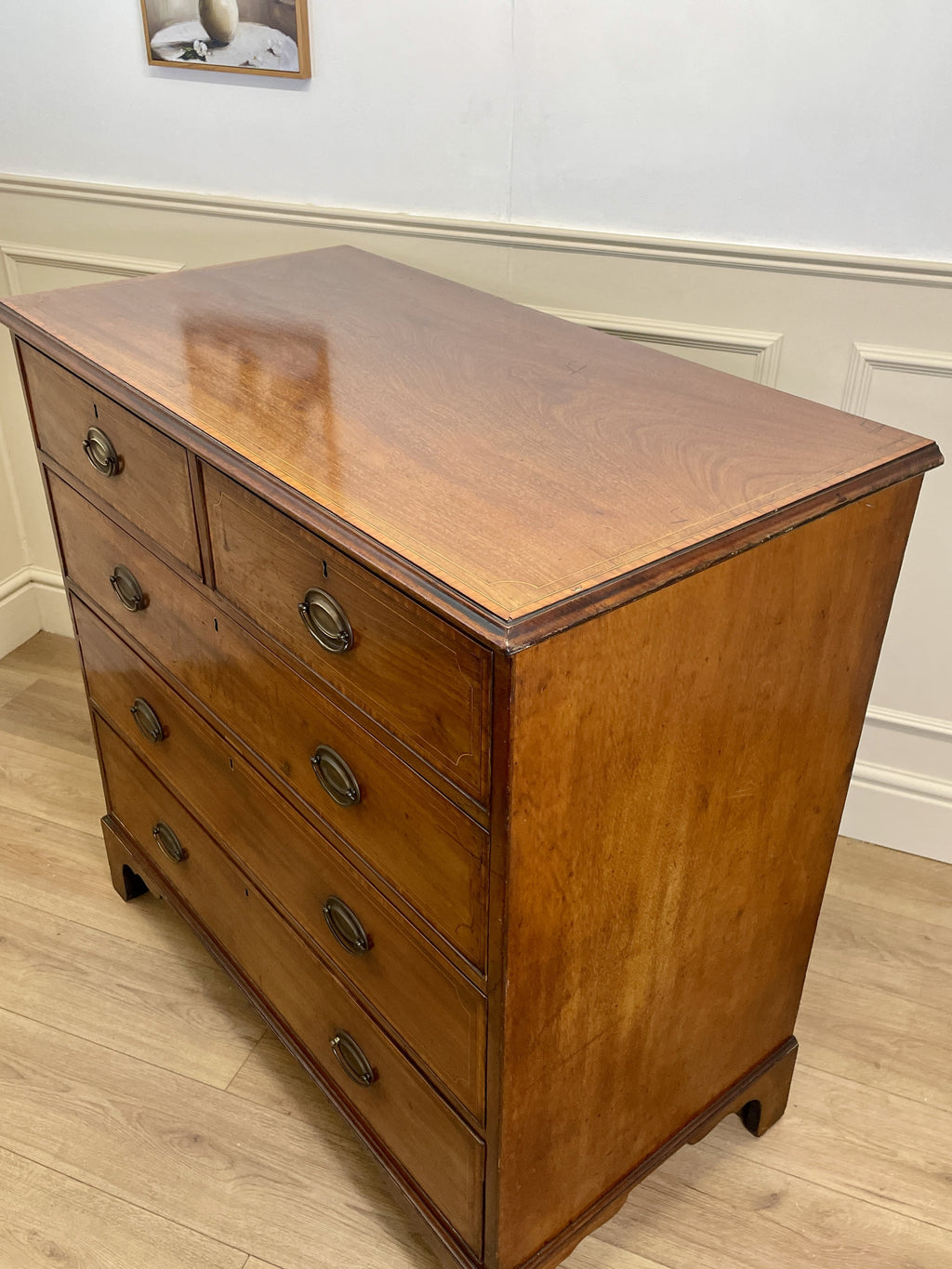 Antique Georgian mahogany and satinwood banded chest of drawers with two short and three long drawers on bracket feet