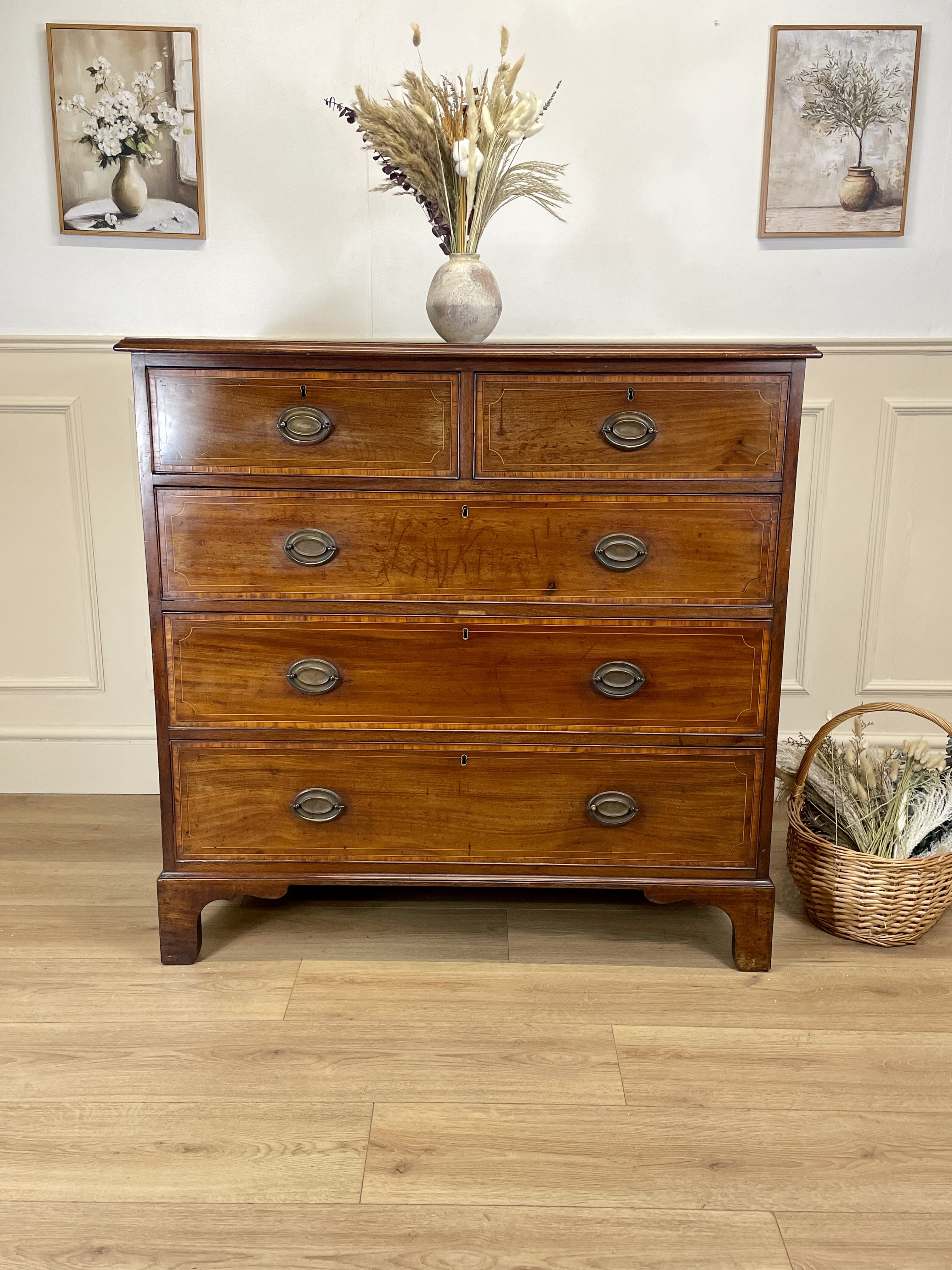 Antique Georgian mahogany and satinwood banded chest of drawers with two short and three long drawers on bracket feet
