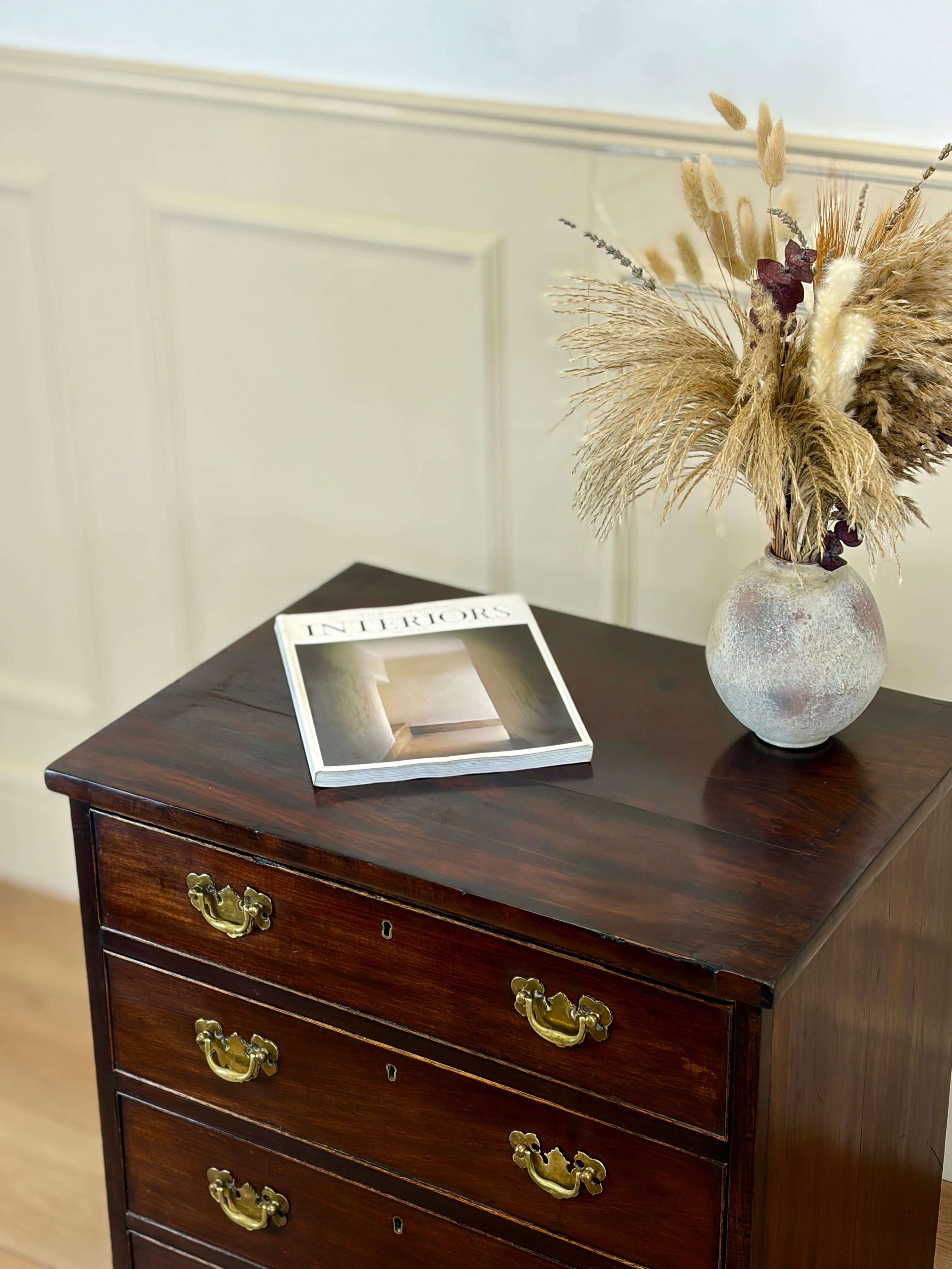 Antique Georgian mahogany small chest of drawers with four drawers and brass plated handles