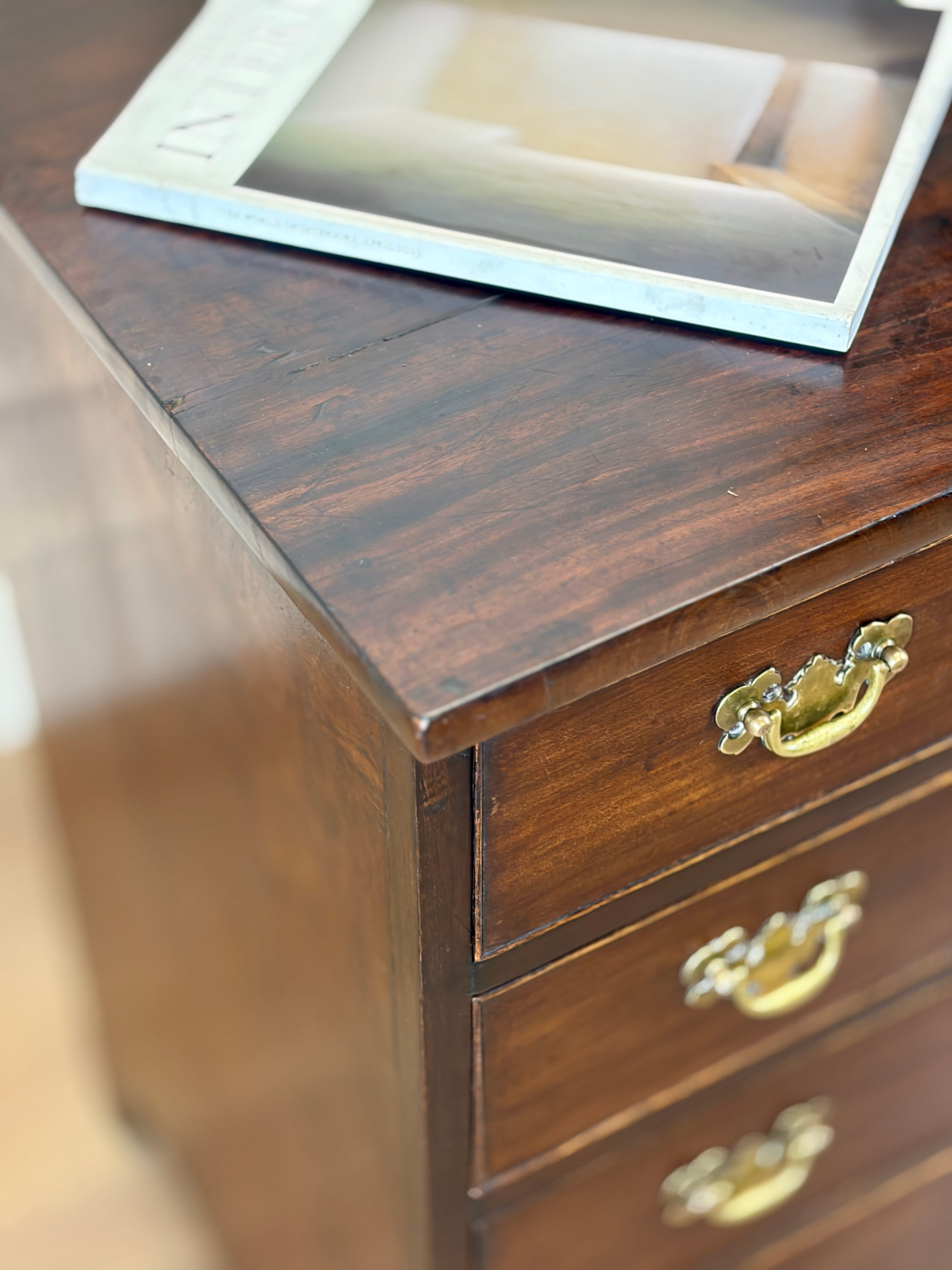 Antique Georgian mahogany small chest of drawers with four drawers and brass plated handles