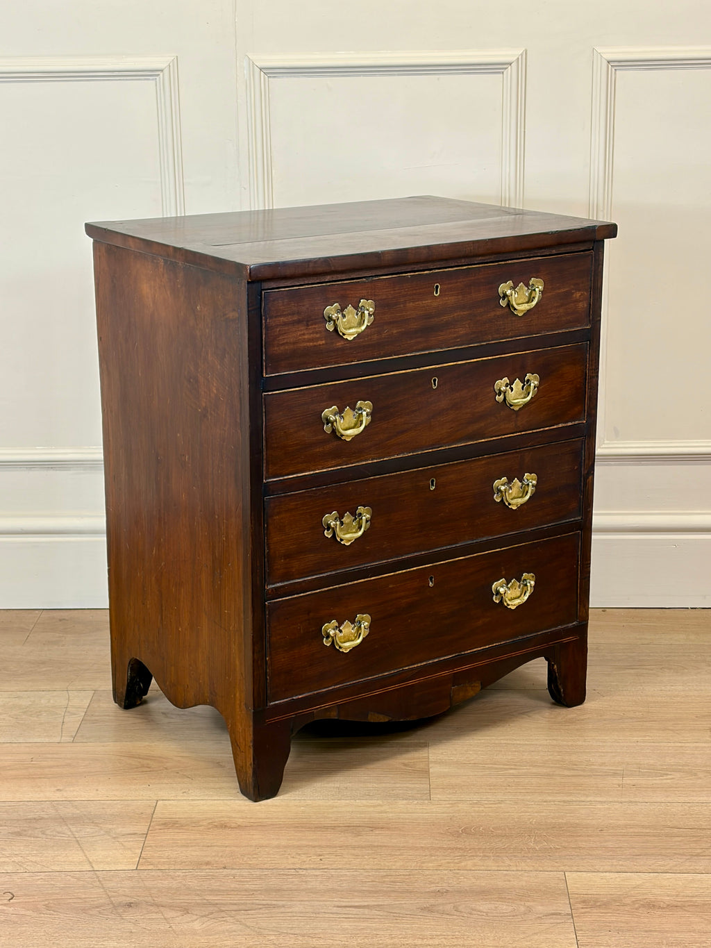 Antique Georgian mahogany small chest of drawers with four drawers and brass plated handles