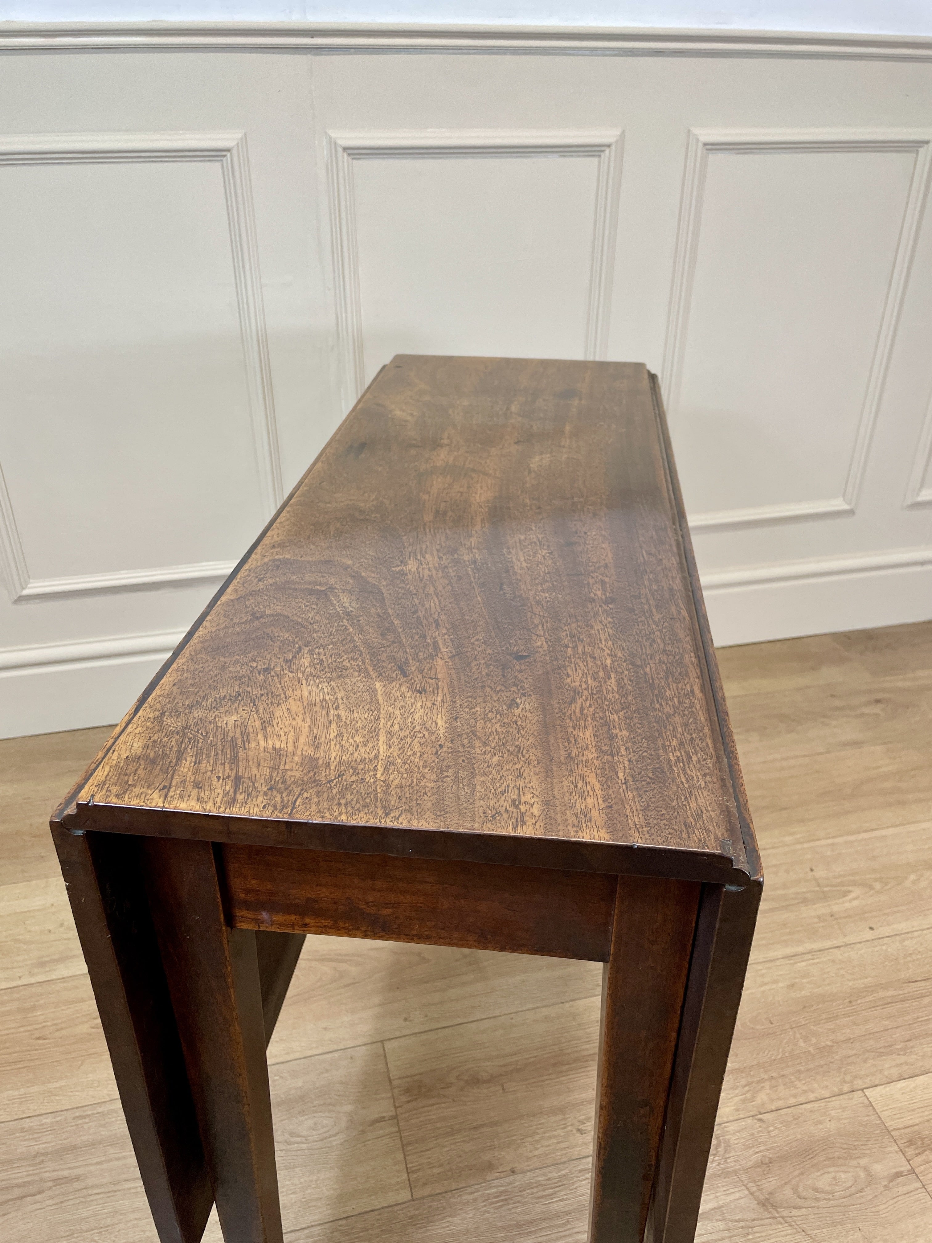 Antique Georgian Mahogany Square Kitchen Table with drop leaves, tapered legs, and rich mahogany finish, ideal for small cottage or farmhouse interiors.