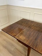 Antique Georgian Mahogany Square Kitchen Table with drop leaves, tapered legs, and rich mahogany finish, ideal for small cottage or farmhouse interiors.