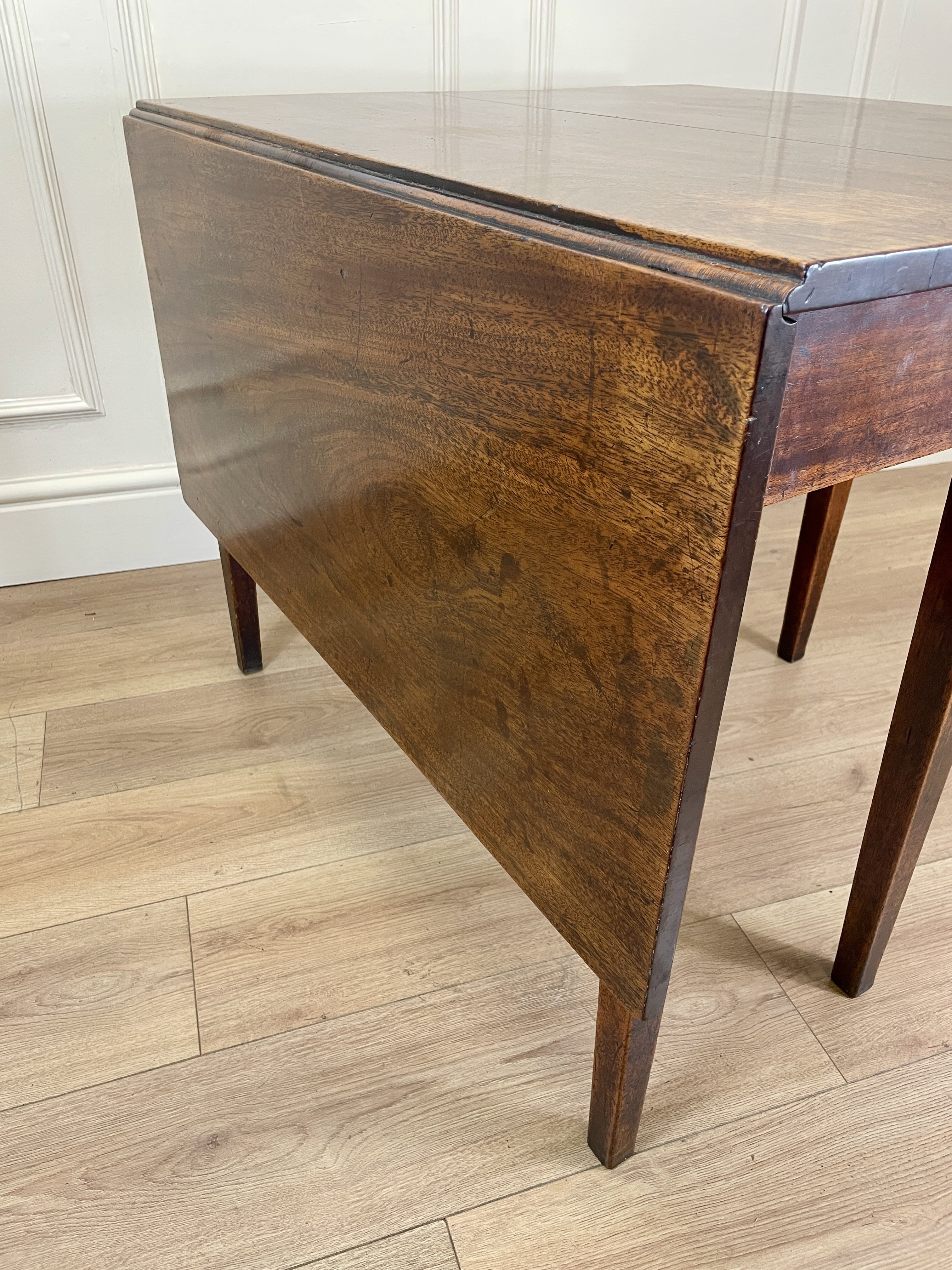 Antique Georgian Mahogany Square Kitchen Table with drop leaves, tapered legs, and rich mahogany finish, ideal for small cottage or farmhouse interiors.