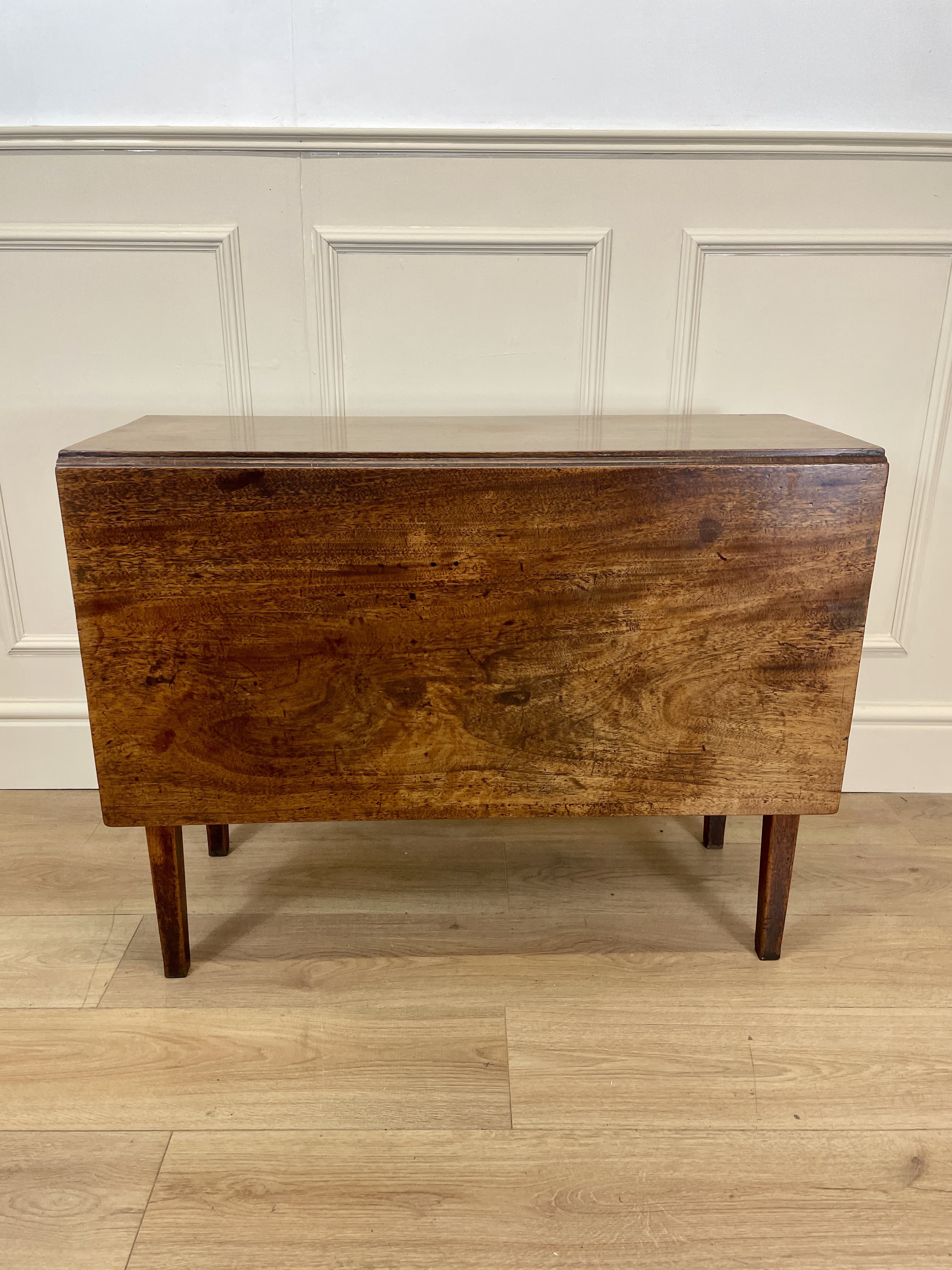 Antique Georgian Mahogany Square Kitchen Table with drop leaves, tapered legs, and rich mahogany finish, ideal for small cottage or farmhouse interiors.