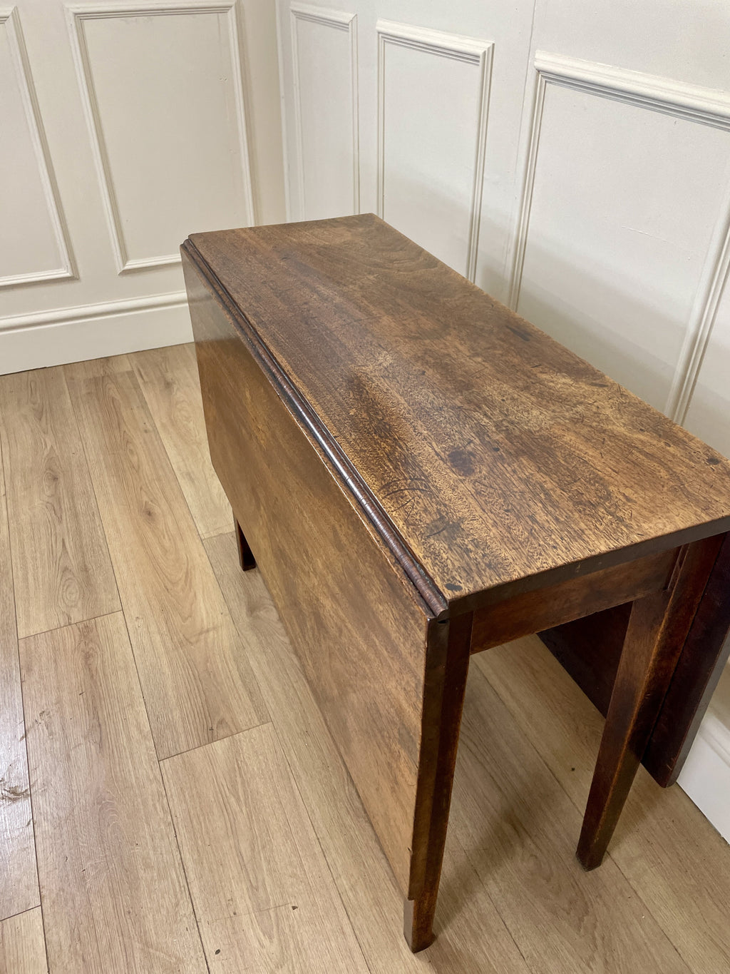 Antique Georgian Mahogany Square Kitchen Table with drop leaves, tapered legs, and rich mahogany finish, ideal for small cottage or farmhouse interiors.