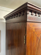 Antique Georgian mahogany tall slim wardrobe with drawers and oval panel doors on ogee bracket feet