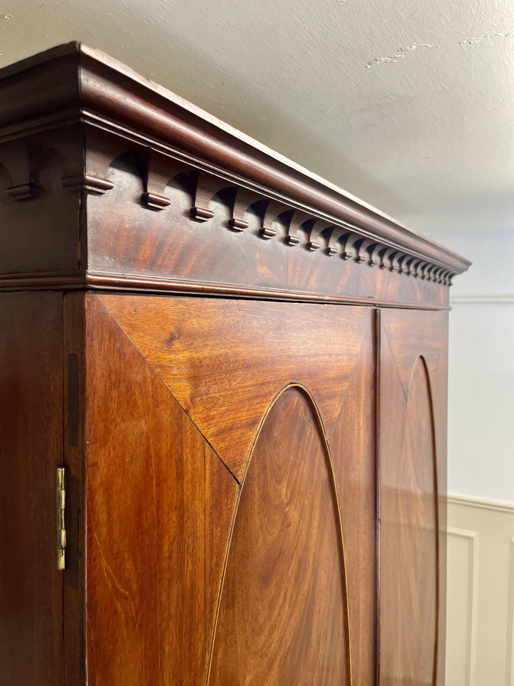Antique Georgian mahogany tall slim wardrobe with drawers and oval panel doors on ogee bracket feet
