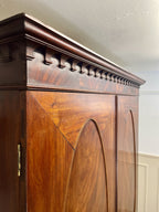 Antique Georgian mahogany tall slim wardrobe with drawers and oval panel doors on ogee bracket feet