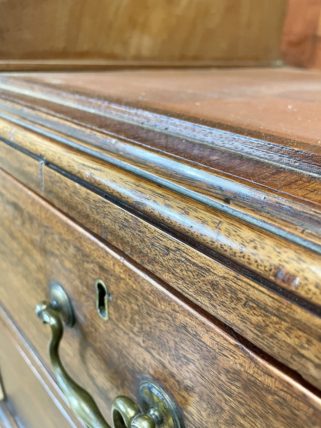 Antique Georgian mahogany tall slim wardrobe with drawers and oval panel doors on ogee bracket feet