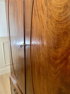 Antique Georgian mahogany tall slim wardrobe with drawers and oval panel doors on ogee bracket feet