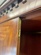 Antique Georgian mahogany tall slim wardrobe with drawers and oval panel doors on ogee bracket feet