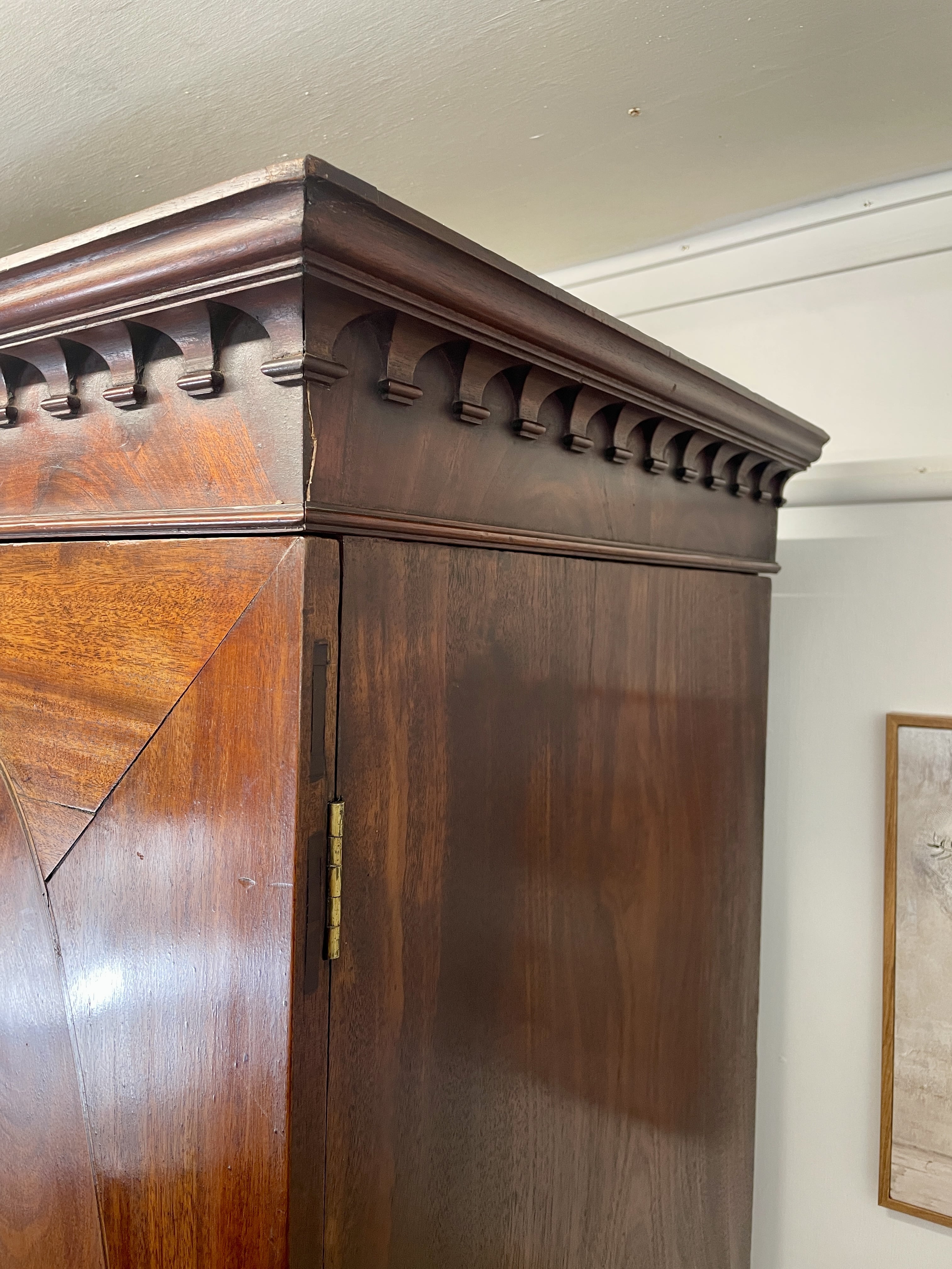 Antique Georgian mahogany tall slim wardrobe with drawers and oval panel doors on ogee bracket feet