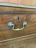 Antique Georgian mahogany tall slim wardrobe with drawers and oval panel doors on ogee bracket feet