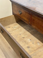 Mid-18th century antique Georgian oak chest of drawers with caddy moulded top, two short and three long graduated drawers, original brass handles, and bracket feet.