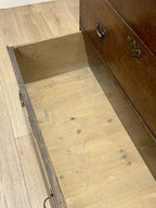 Mid-18th century antique Georgian oak chest of drawers with caddy moulded top, two short and three long graduated drawers, original brass handles, and bracket feet.