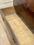 Mid-18th century antique Georgian oak chest of drawers with caddy moulded top, two short and three long graduated drawers, original brass handles, and bracket feet.