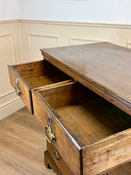 Antique light oak farmhouse chest of drawers with brass handles and patina