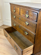 Antique light oak farmhouse chest of drawers with brass handles and patina