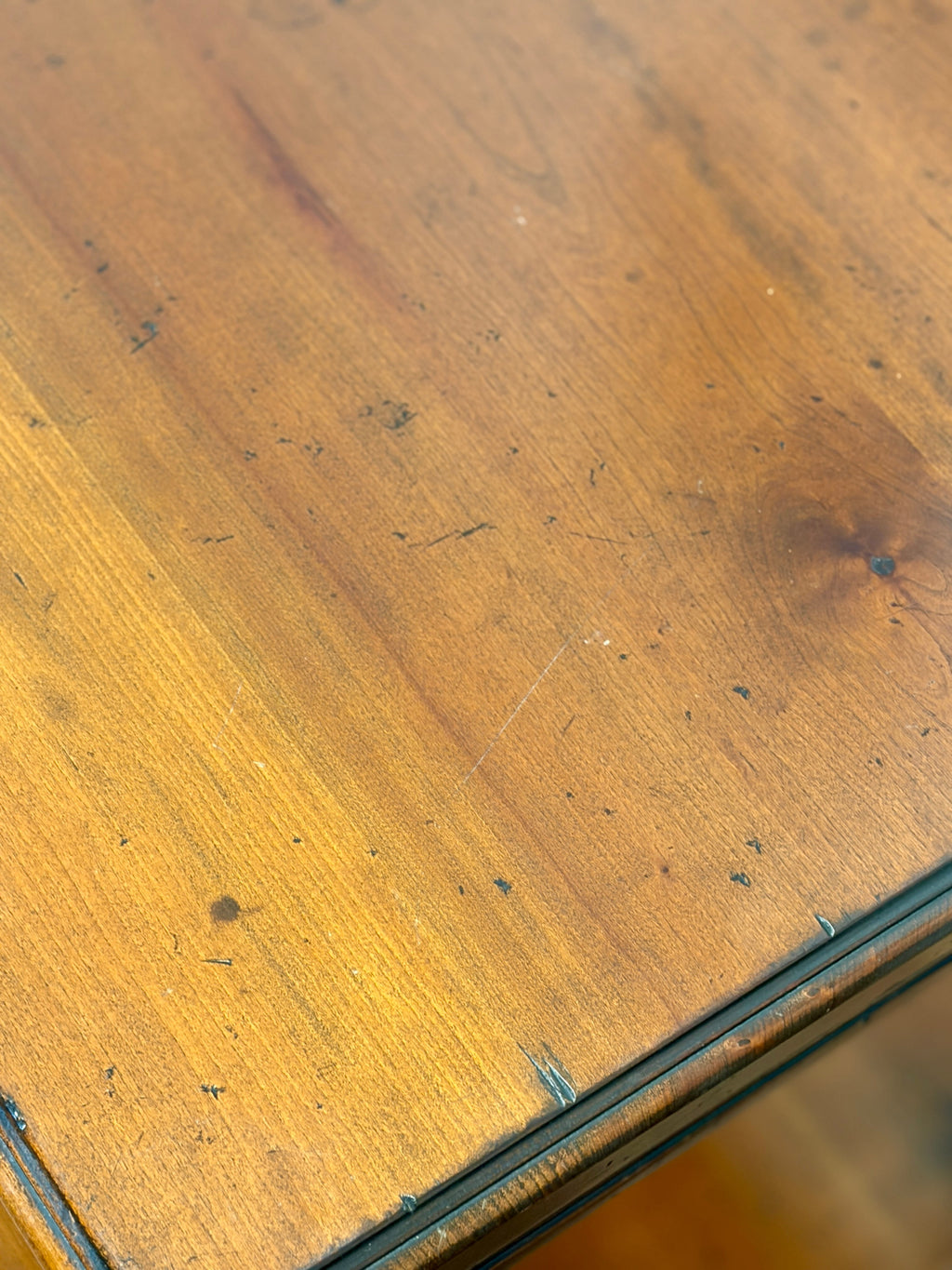 Close-up of a wooden surface with visible grain and texture