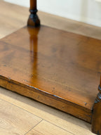 Close-up of a wooden surface with a blurred background