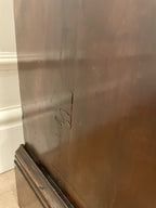 Stainless steel appliance with a scratch on the surface