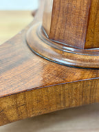 Close-up of a wooden surface with a focus on texture and grain.