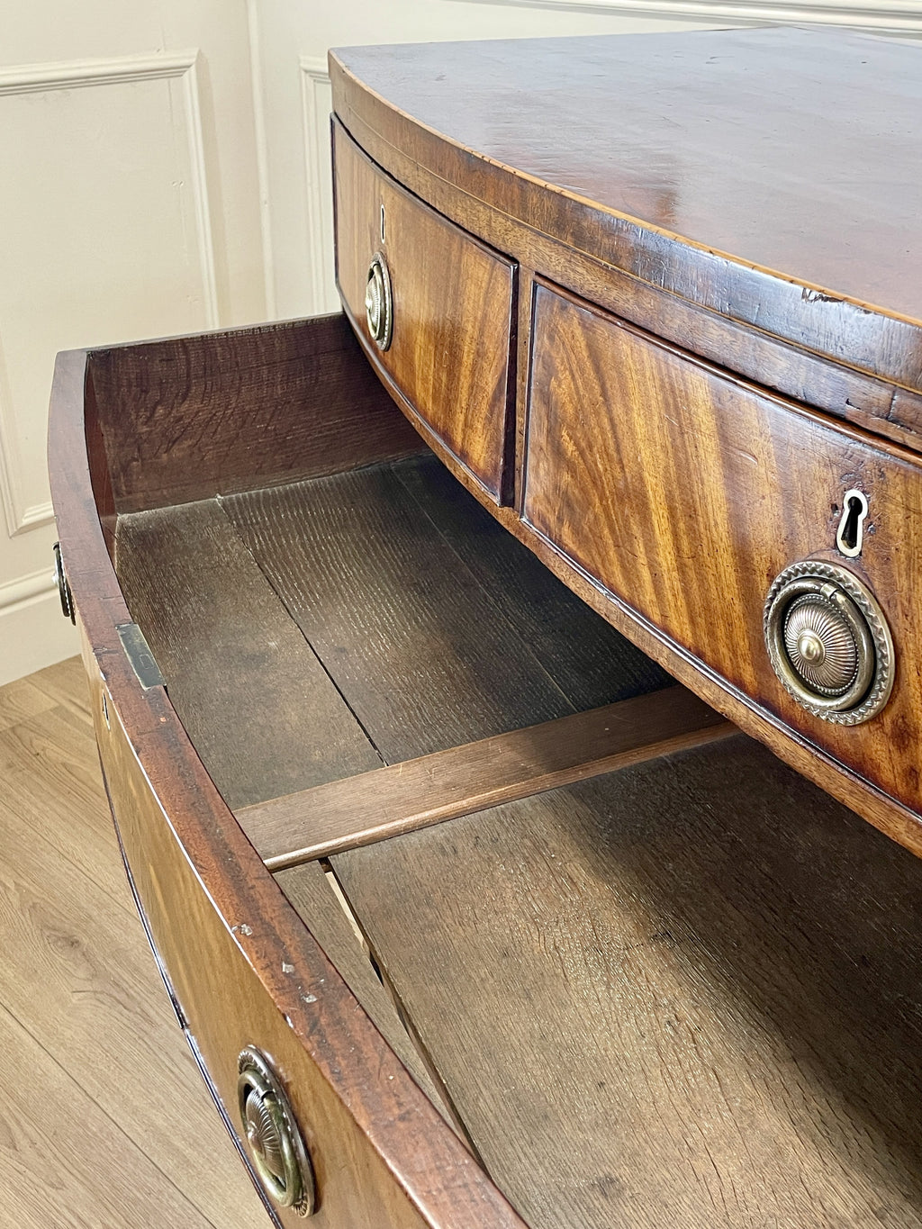 ntique Regency mahogany bowfront chest of drawers with two short over three long drawers, ideal chest of drawers for bedroom in a cottage interior.