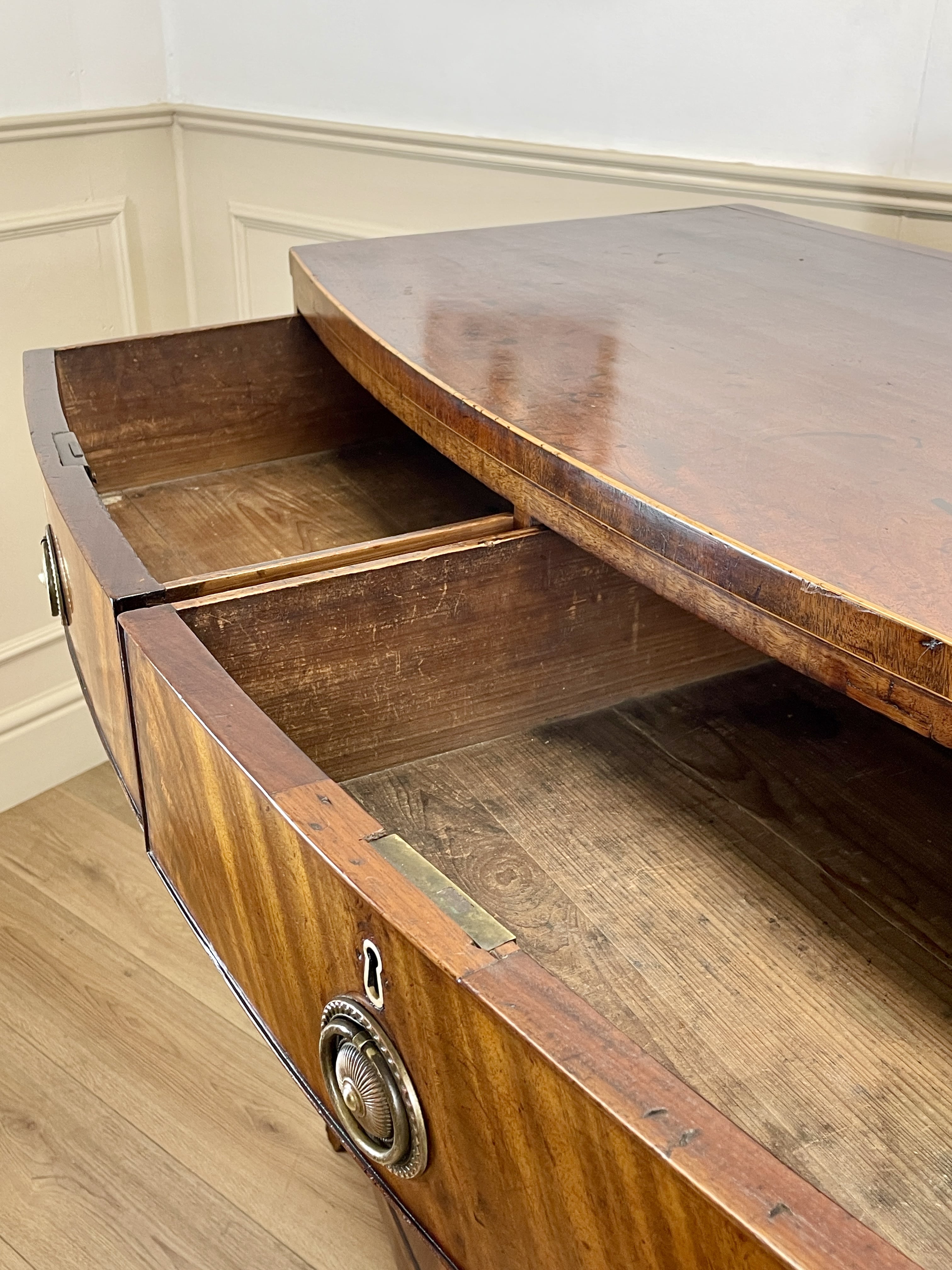 ntique Regency mahogany bowfront chest of drawers with two short over three long drawers, ideal chest of drawers for bedroom in a cottage interior.