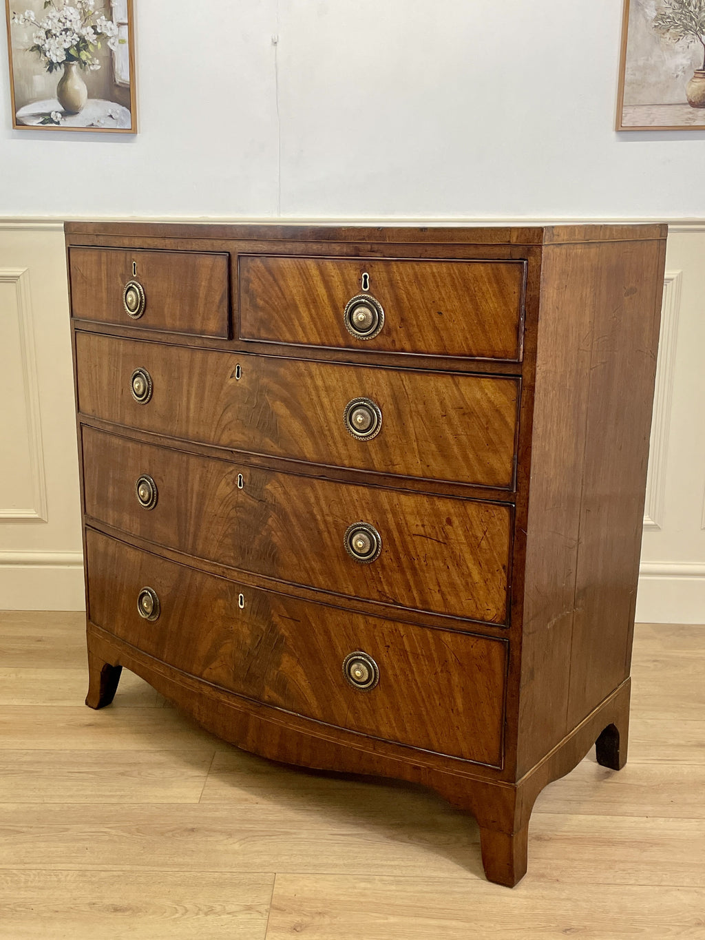 ntique Regency mahogany bowfront chest of drawers with two short over three long drawers, ideal chest of drawers for bedroom in a cottage interior.