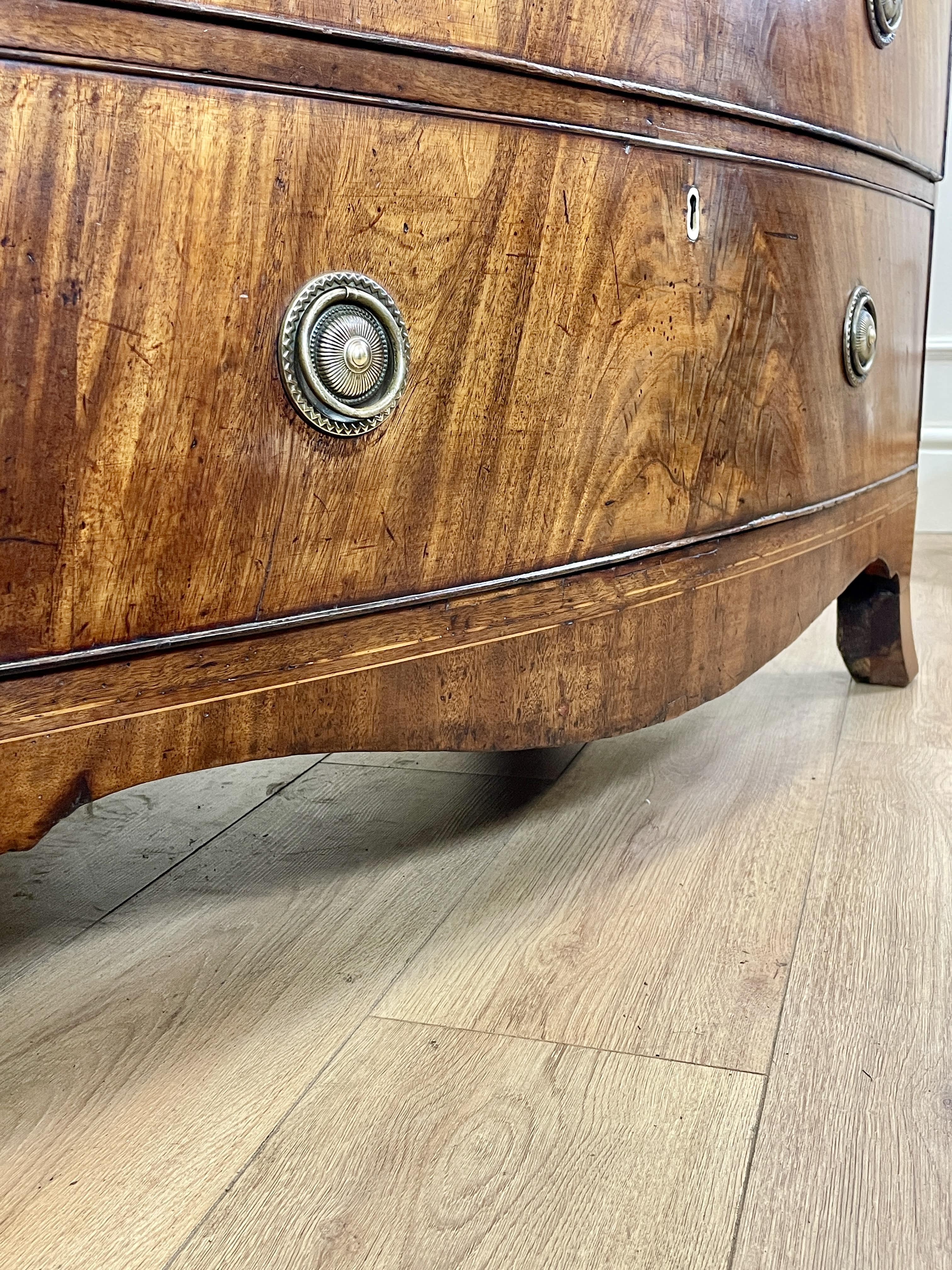ntique Regency mahogany bowfront chest of drawers with two short over three long drawers, ideal chest of drawers for bedroom in a cottage interior.