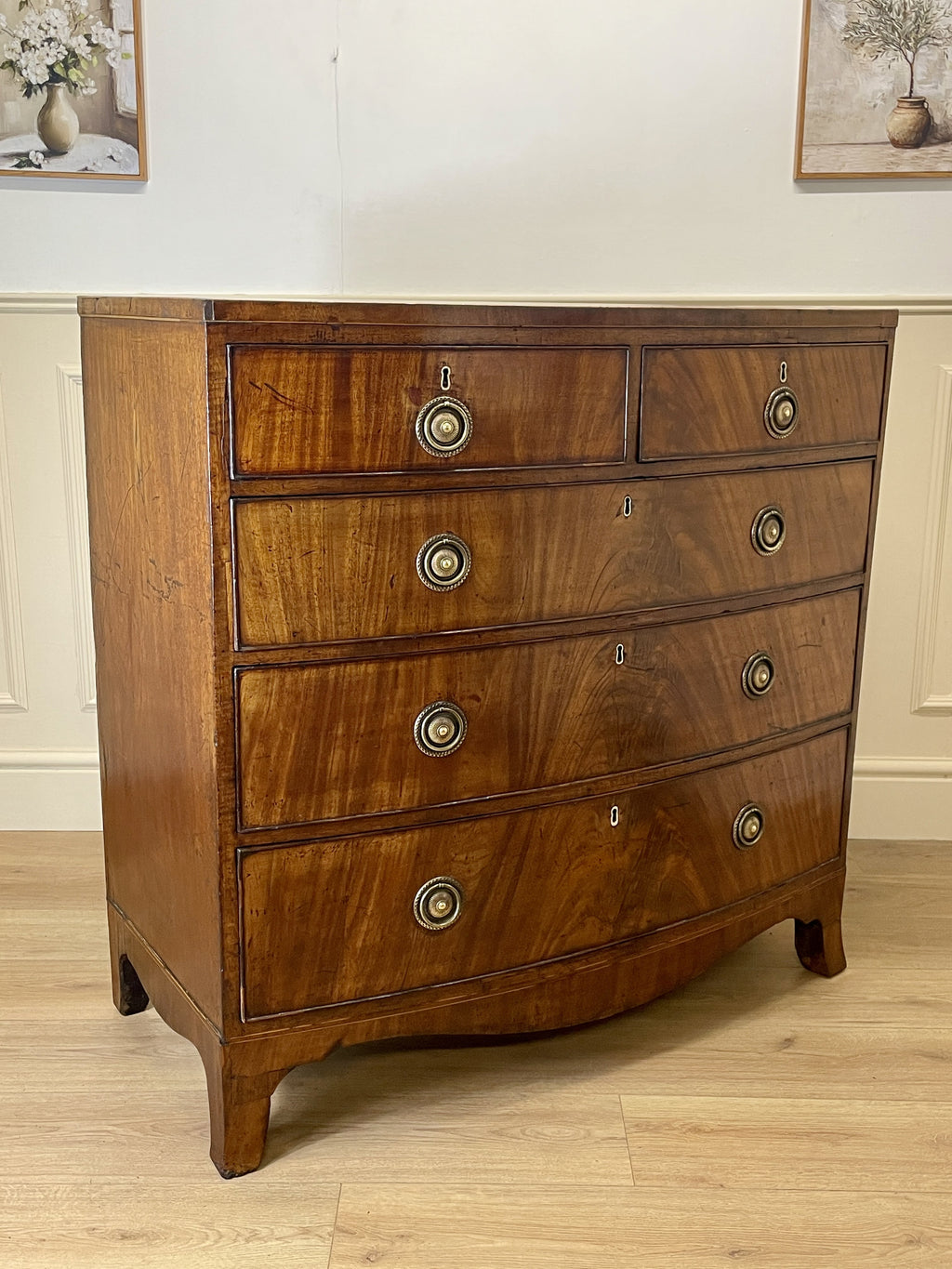 ntique Regency mahogany bowfront chest of drawers with two short over three long drawers, ideal chest of drawers for bedroom in a cottage interior.