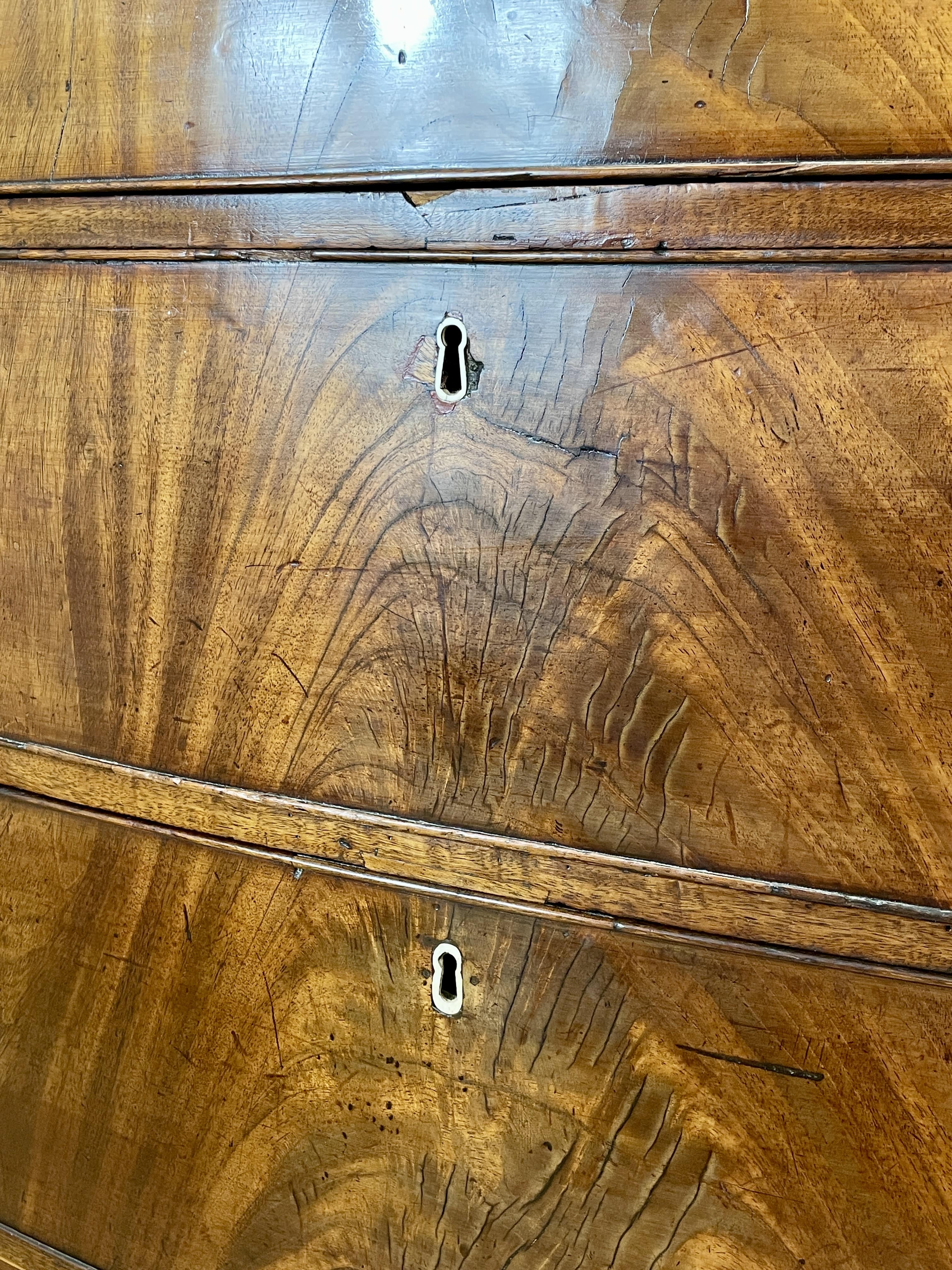 ntique Regency mahogany bowfront chest of drawers with two short over three long drawers, ideal chest of drawers for bedroom in a cottage interior.